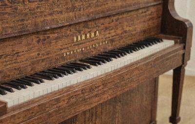 Yamaha upright piano refinishing project showing beautiful wood grain
